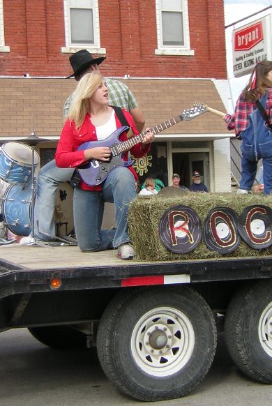 kids with guitars on float