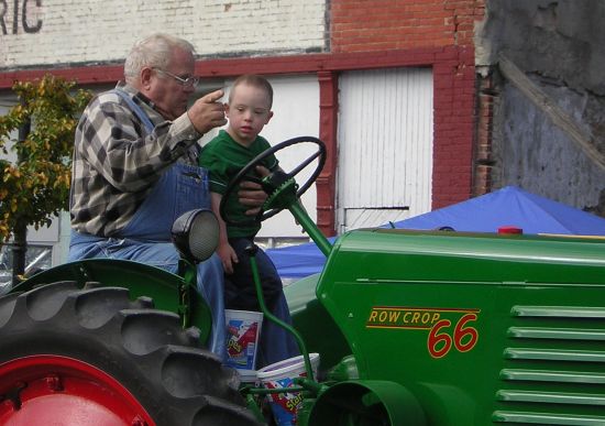Man and boy on tractor