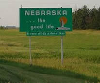 road sign: Nebraska, the good life, home of Arbor Day